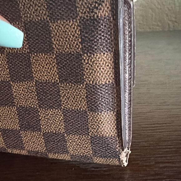 Louis Vuitton Damier Ebene Trifold
Wallet - Made in France - Picture 4 of 11
